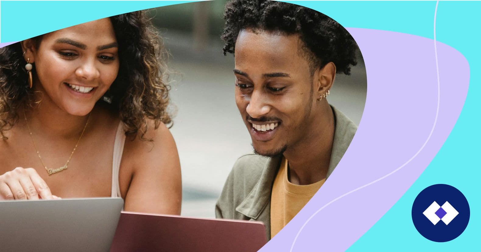 a happy man and woman collaborating together on their laptops representing lead management.