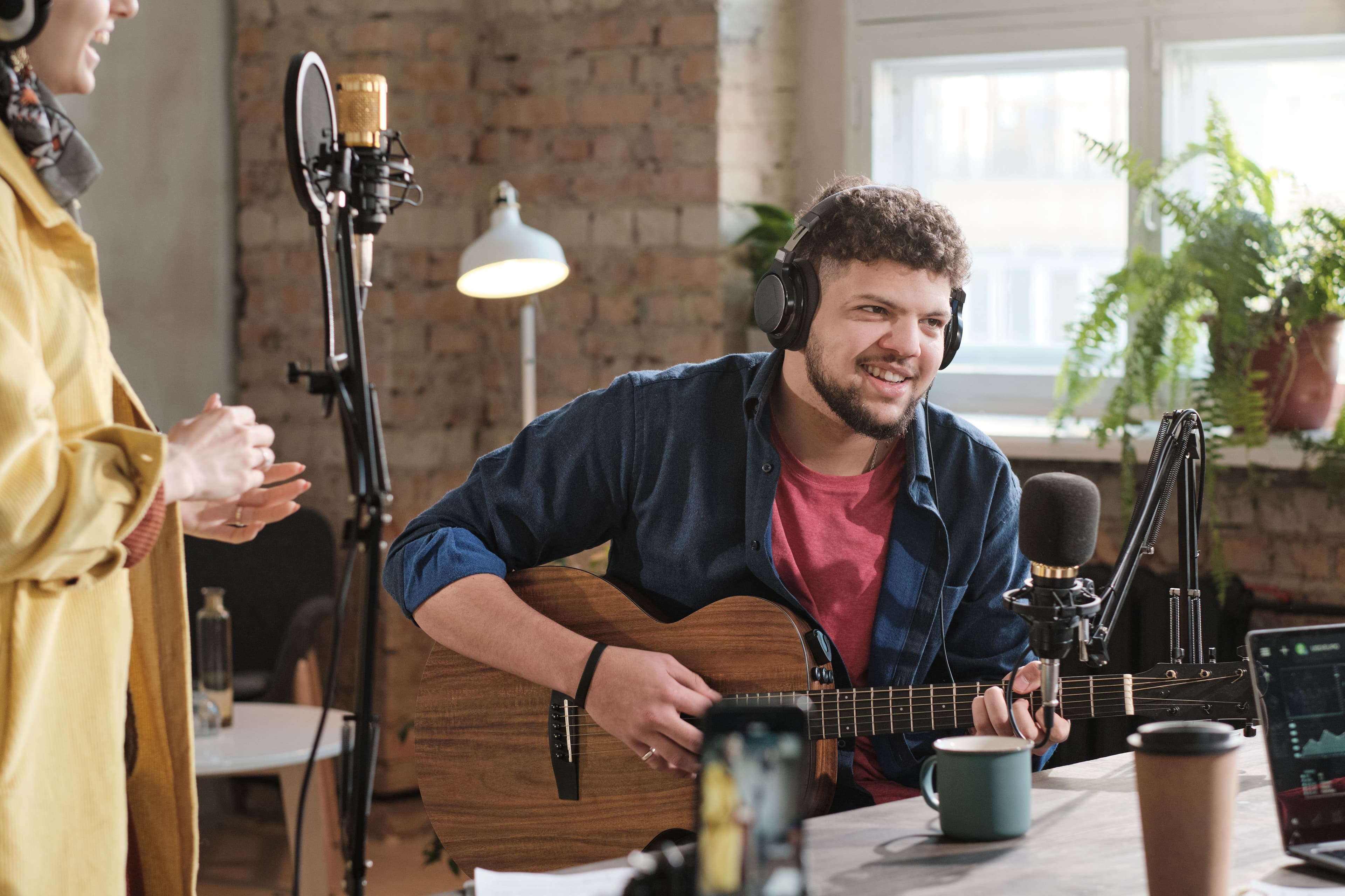 Man Playing Guitar In Studio 1017275