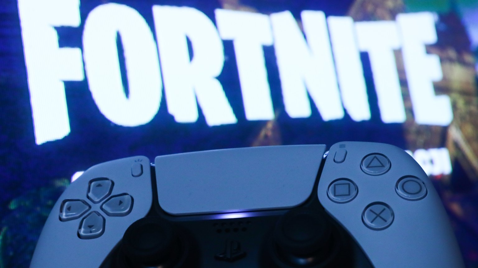 game controller and fortnite logo