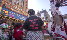 Dancers in a prayer circle during an event celebrating Indigenous Peoples' Day.