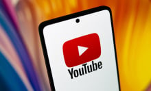 YouTube logo on a smartphone.