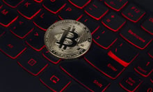 Bitcoin on a red backlit keyboard