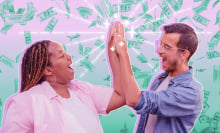 two people high fiving with money falling in the background