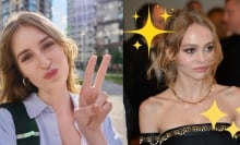 A woman throwing up a peace sign next to Lily-Rose Depp