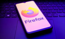 The Mozilla Firefox logo appears on the screen of a smartphone