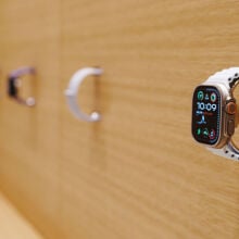 Apple Watches on wall display at Apple Store in Spain