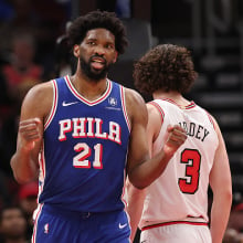 Joel Embiid #21 of the Philadelphia 76ers celebrates a basket against the Chicago Bulls during the second half at the United Center on December 08, 2024 in Chicago, Illinois