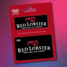 $50 red lobster gift card angled on a pink and black background