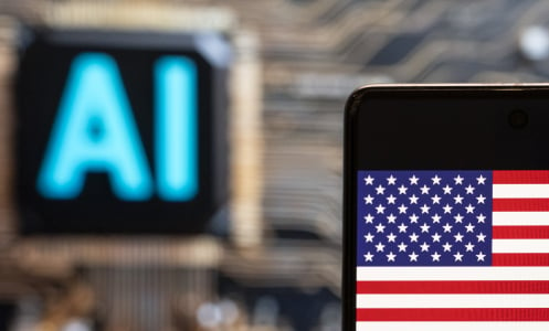 A phone showing an American flag in front of a glowing sign that says AI.