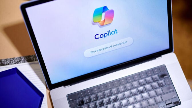 The Copilot logo arranged on a laptop 