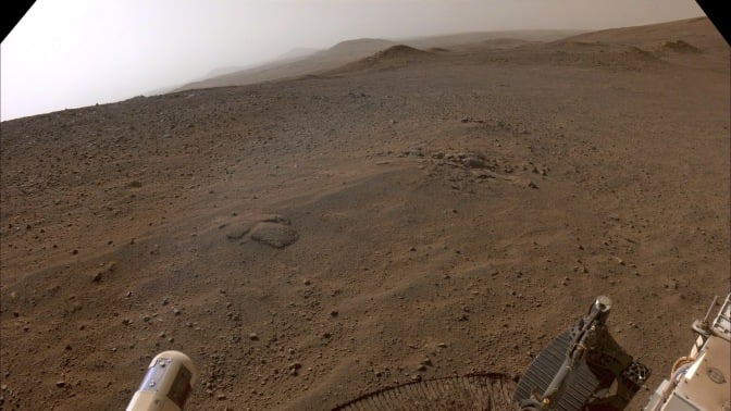 NASA Perseverance rover's view from the top of the Jezero Crater rim on Mars.