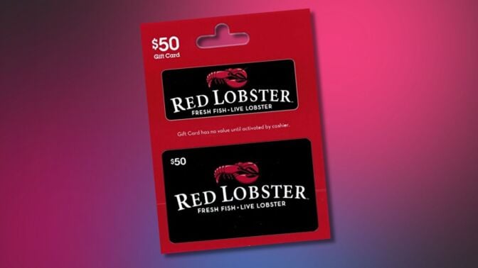 $50 red lobster gift card angled on a pink and black background