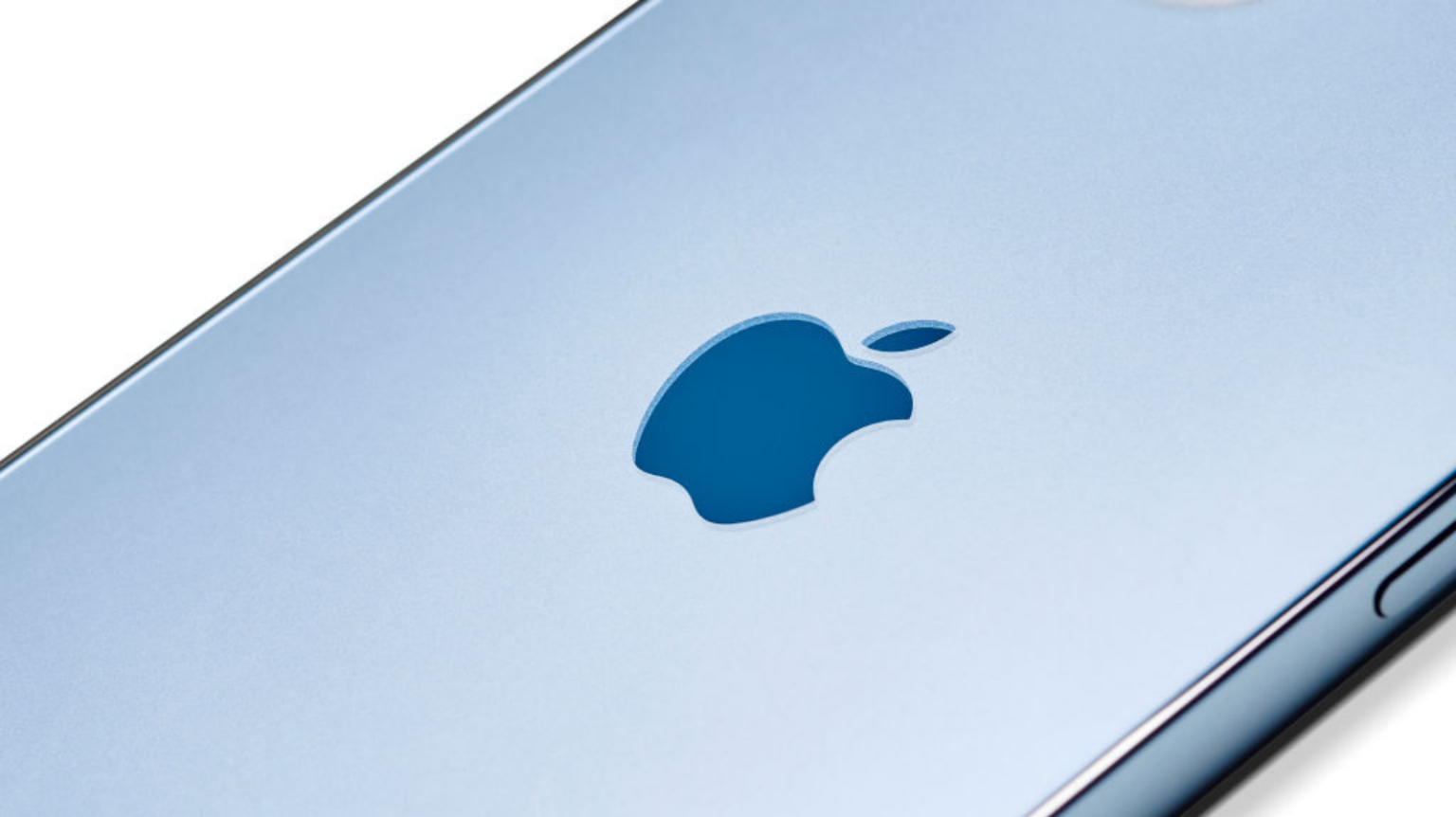 A close up of the logo on an Apple iPhone 12 Pro with a Pacific Blue finish.