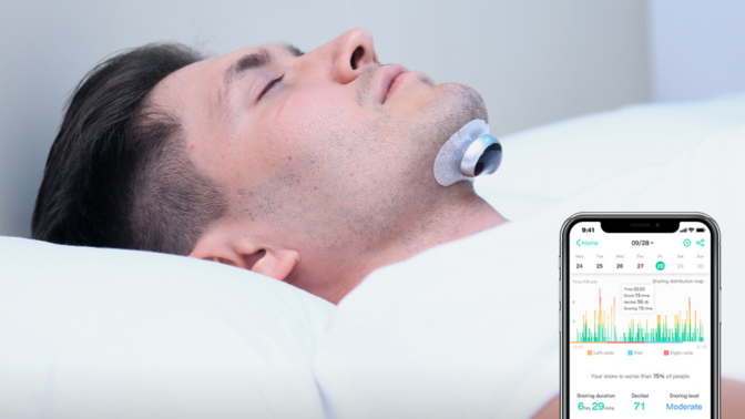 man laying down with snore circle device and app